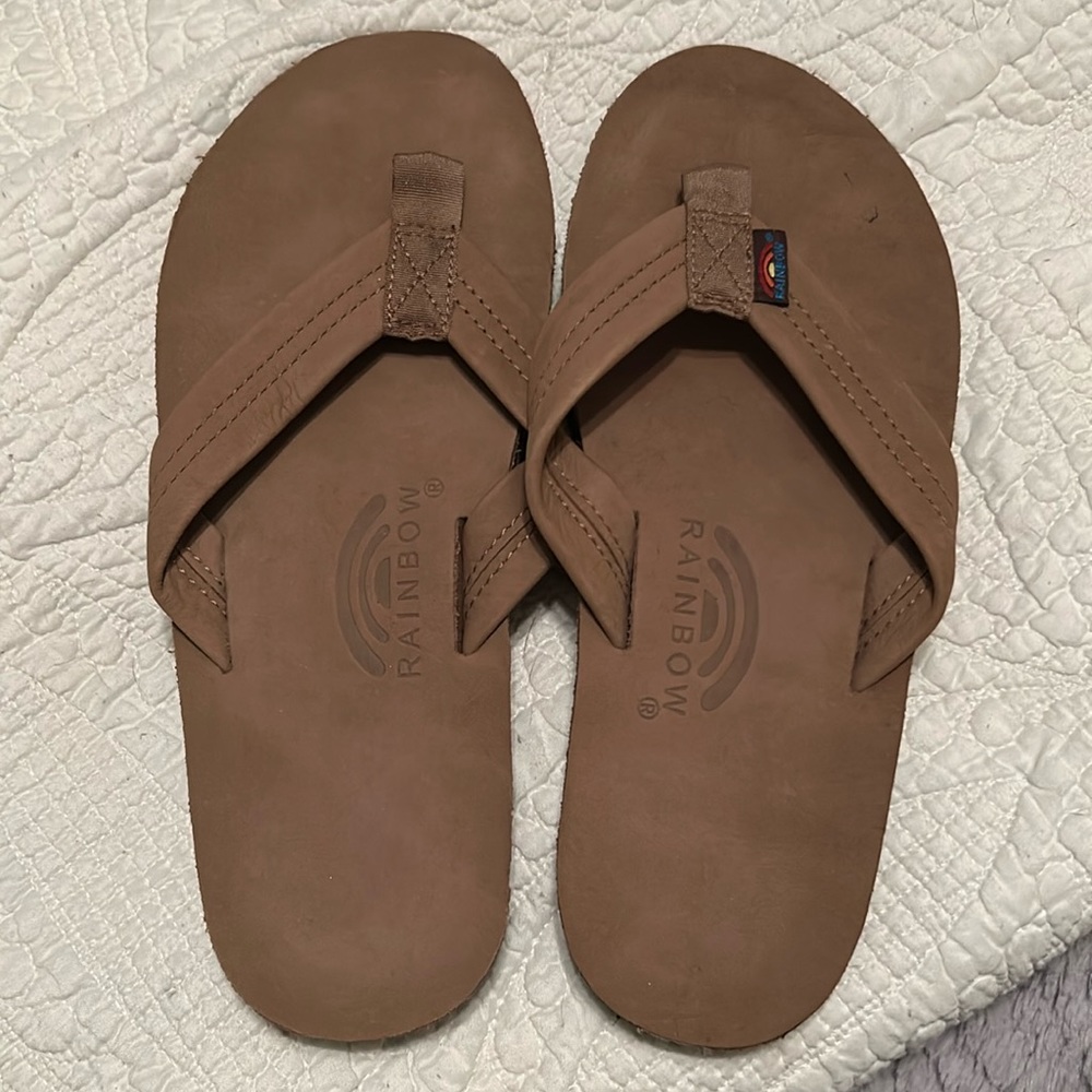 Women’s rainbow flip flops. Worn once